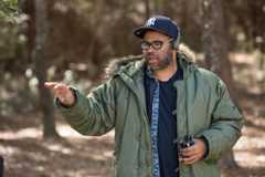 An image of director jordan peele while working on set